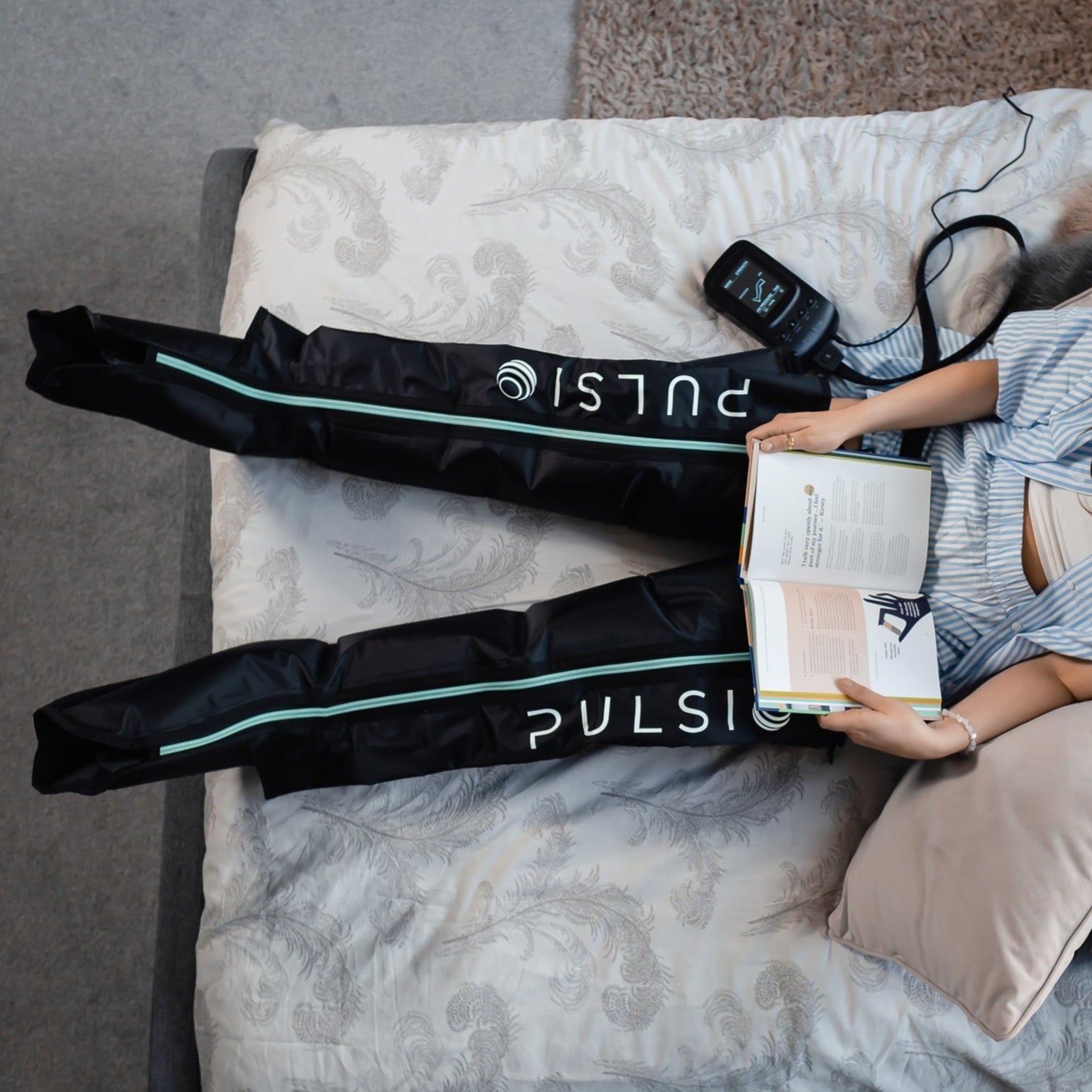 Leg compression sleeves with a massage gun, showing a £149.99 savings offer.