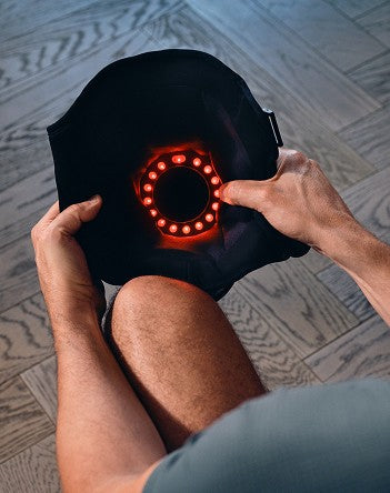Infrared light ring glowing inside the Infra Knee Support