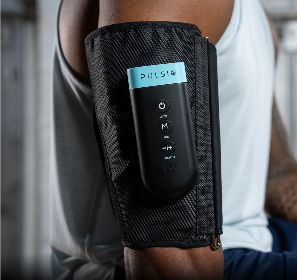 A black fabric-panel with an attached control device labeled 'PULSIO' on a grey background.