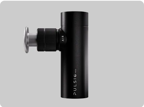 Black massage gun with 'PULSIO PRO' branding on a gray background.