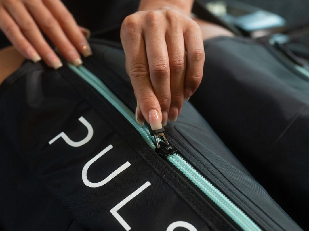 Zipping up a Pulsio Compression boot