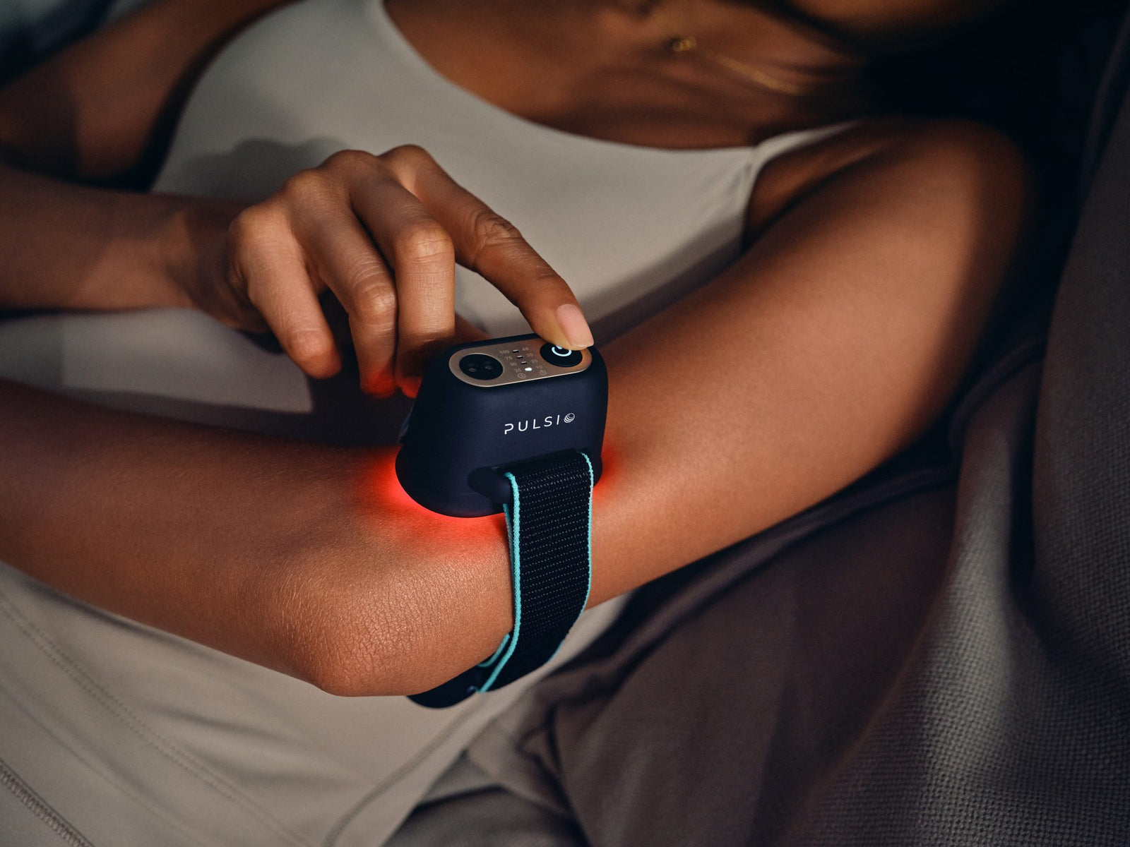 Infra Pod glowing red on the forearm